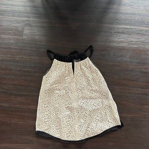 Gorgeous white and black tank top with leather detailing, size M